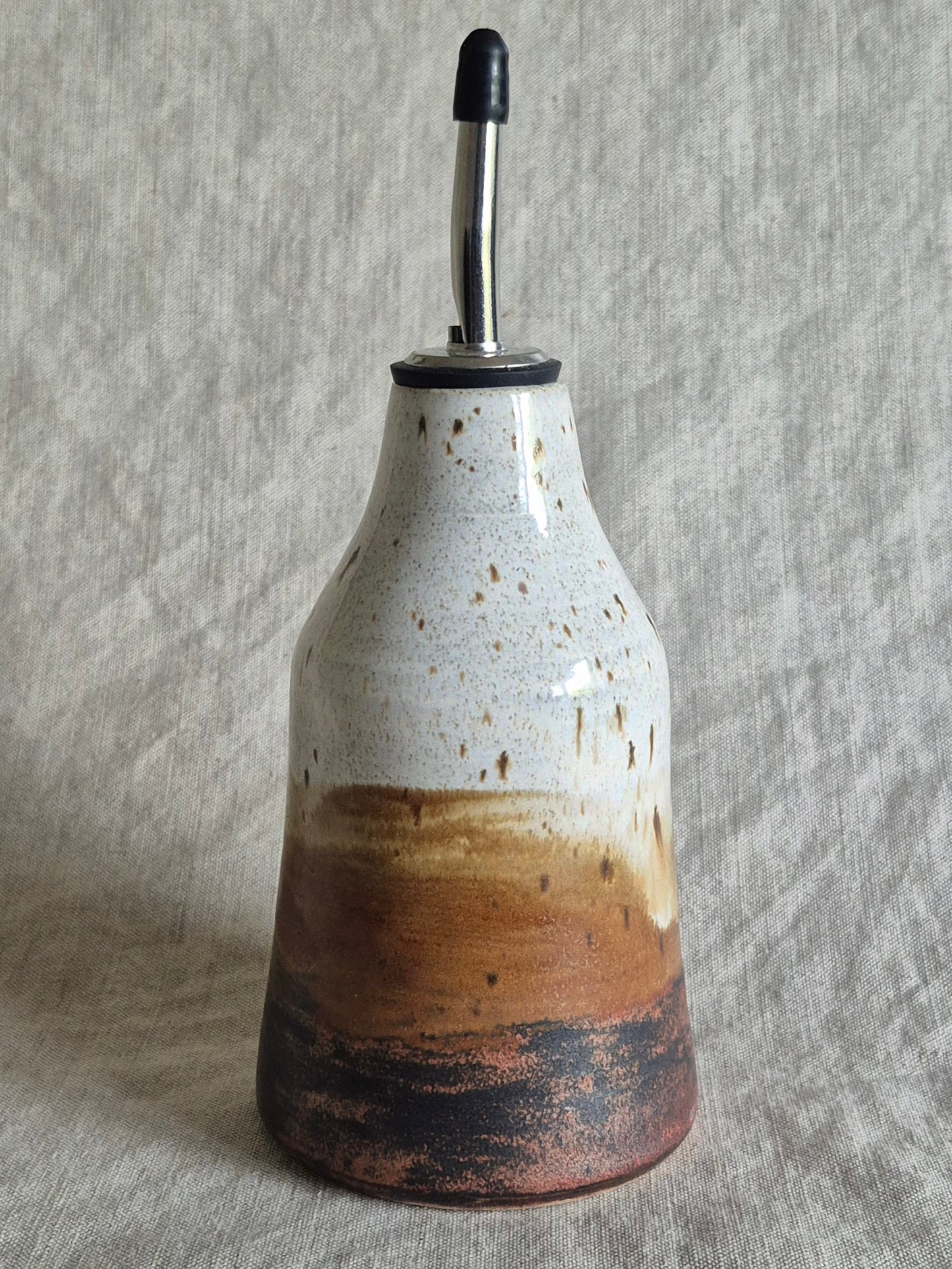 Oil Pourer in Red-Tailed Hawk