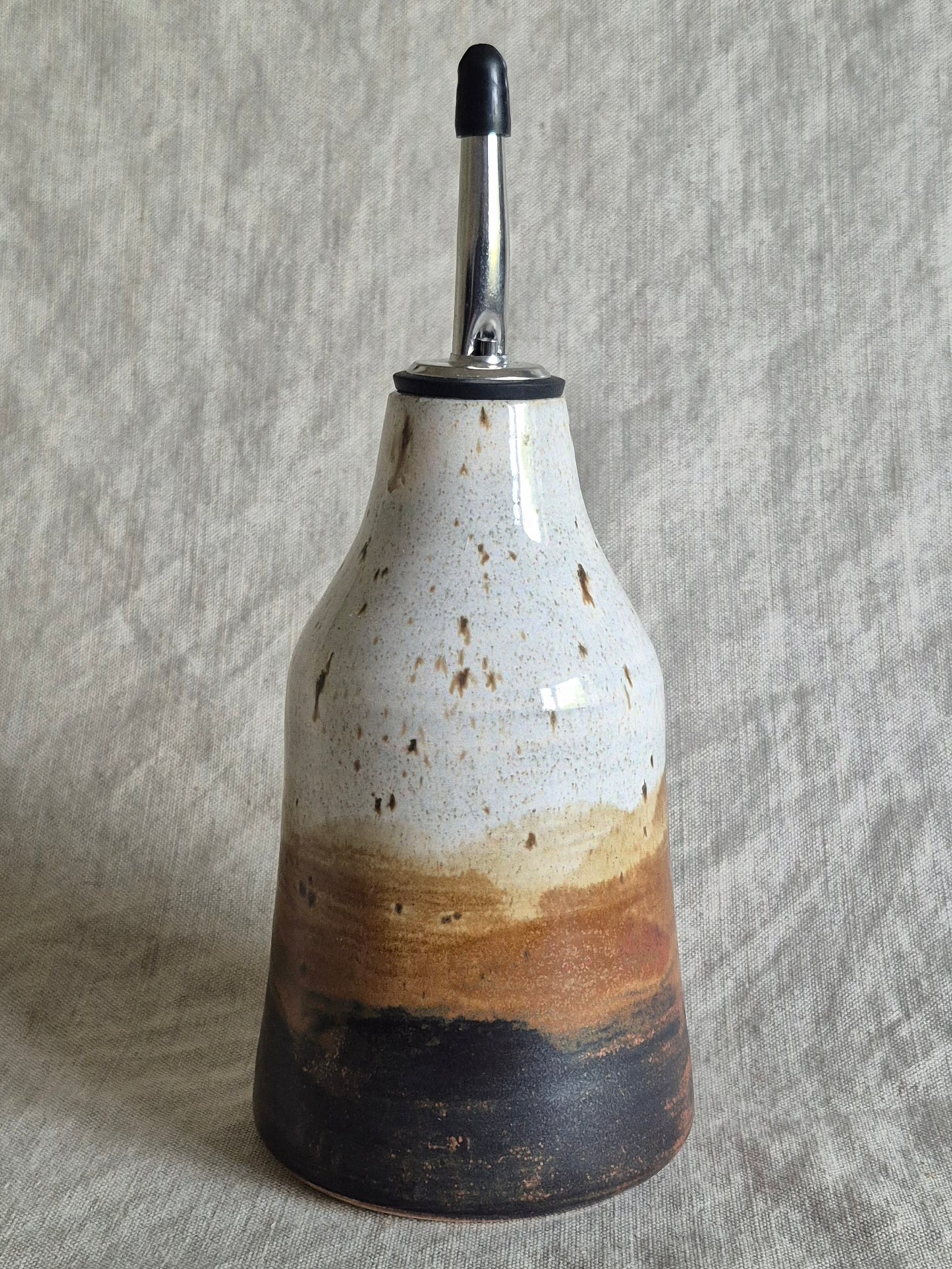 Oil Pourer in Red-Tailed Hawk