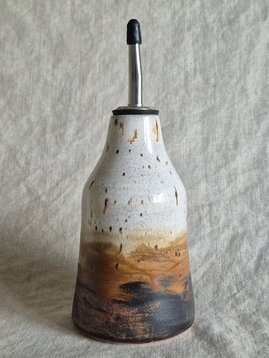 Oil Pourer in Red-Tailed Hawk