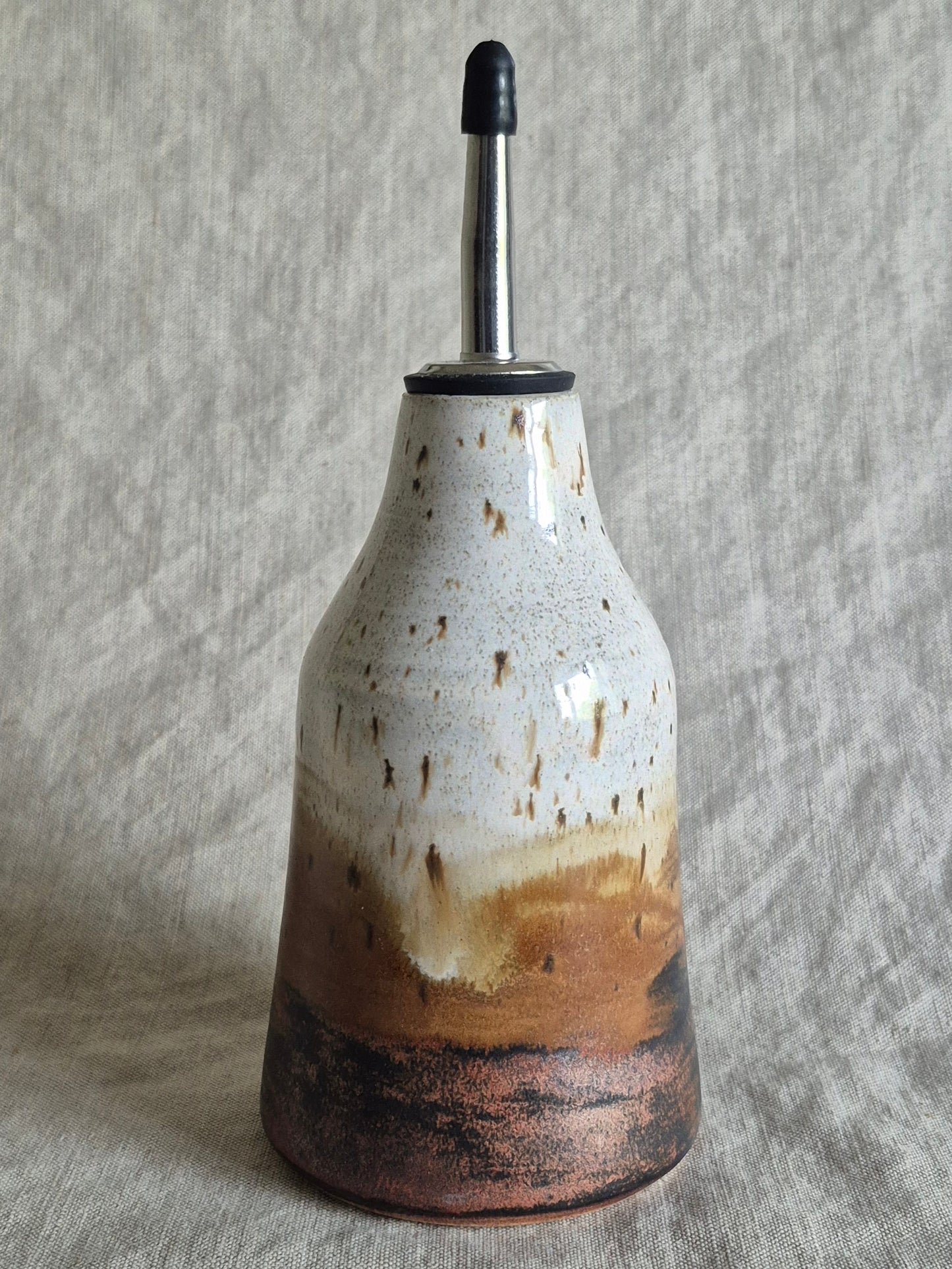 Oil Pourer in Red-Tailed Hawk